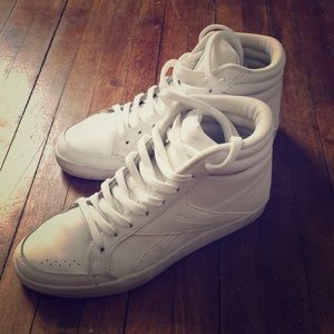 white leather high top reebok sneakers